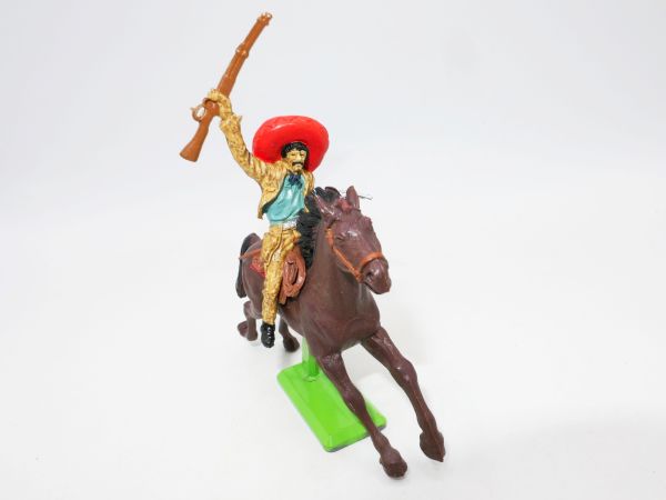 Britains Deetail Mexican on horseback with pistol, holding up rifle