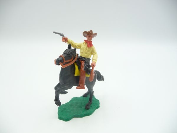 Timpo Toys Cowboy 2nd version riding with moneybag + pistol