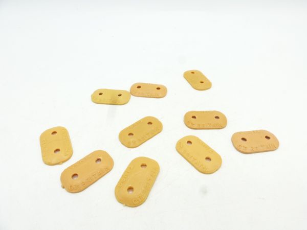 Timpo Toys 10 two-hole base plates for foot figures, beige