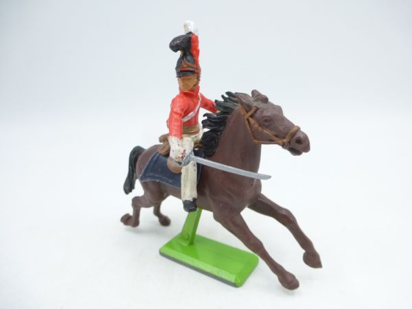 Britains Deetail Waterloo Soldier riding, sabre at side, red uniform
