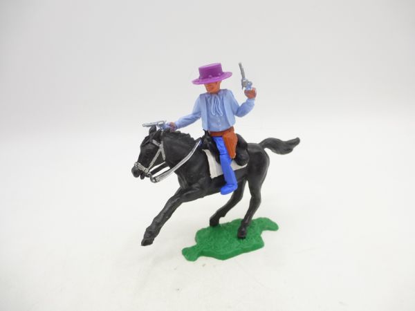 Timpo Toys Cowboy 1. Version reitend, 2 Pistolen wild schießend