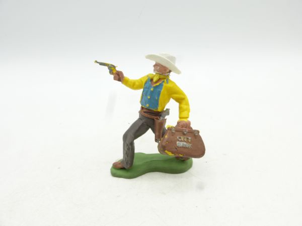 Britains Swoppets Cowboy running with pistol + money bag