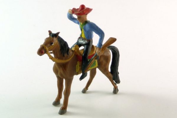 Merten Cowboy mounted with rifle, peering