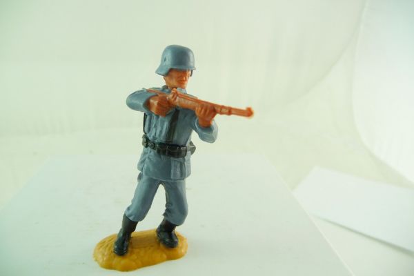 Timpo Toys Deutscher stehend Gewehr schießend, fester Helm