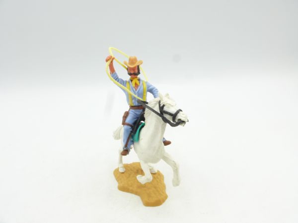 Timpo Toys Cowboy 4th version on horseback with lasso