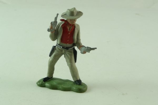 Britains / Herald Cowboy firing with 2 pistols