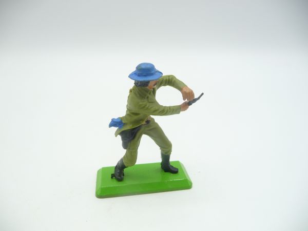 Britains Deetail Cowboy holding / firing pistol with both hands (lime green)