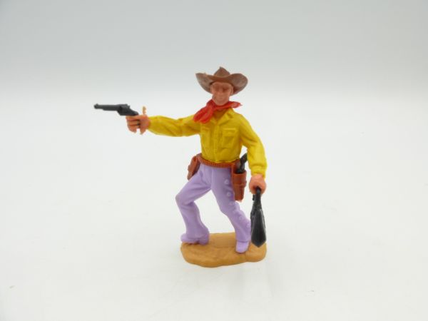 Timpo Toys Cowboy 2nd version walking with pistol + bag