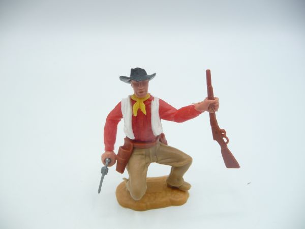 Timpo Toys Cowboy 2. Version hockend mit Pistole + Gewehr