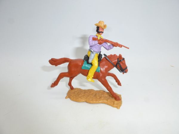 Timpo Toys Cowboy 3rd version riding, shooting rifle