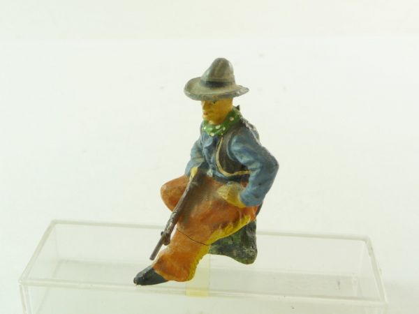Elastolin Composition Cowboy sitting with rifle (post-war), orange trousers