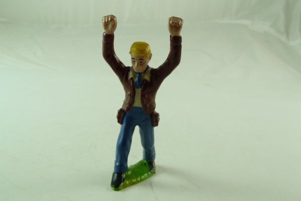 Heimo Cowboy standing with raised hands