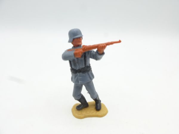Timpo Toys Deutscher Soldat Gewehr schießend