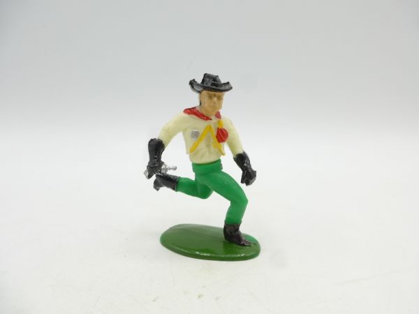 Heinerle Manurba Drehfigur Cowboy laufend mit Pistole - selten