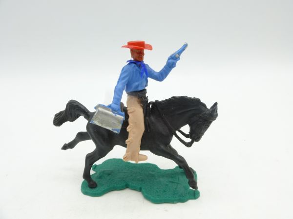 Lone Star Cowboy reitend mit Geldtasche + Pistole