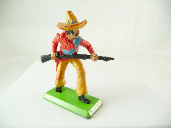 Britains Deetail Mexican going ahead, rifle in front of body, red/ochre