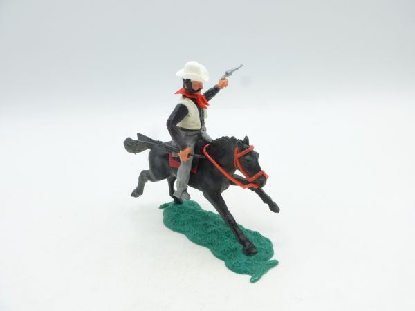 Timpo Toys Cowboy 3. Version zu Pferd mit schwarzem Gewehr