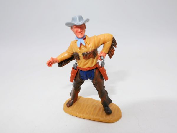 Timpo Toys Cowboy 4th version with fringed shirt, shooting pistol, with chaps