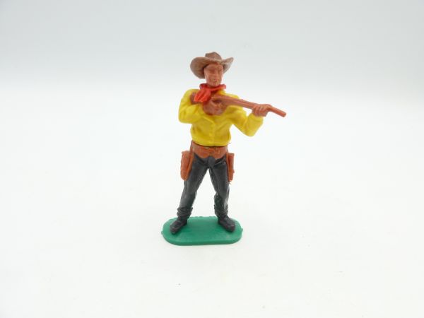 Timpo Toys Cowboy standing, firing with short rifle