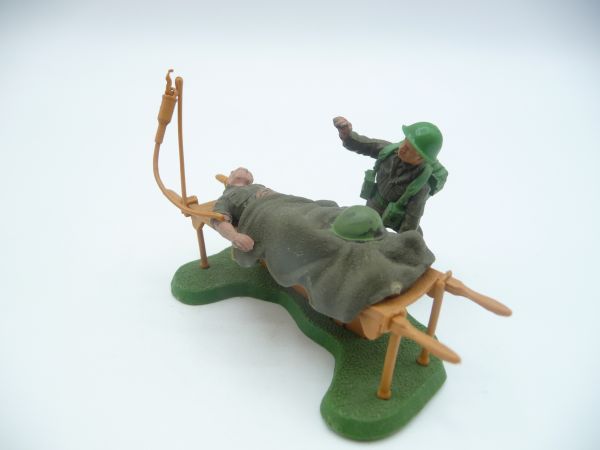 Britains Swoppets Wounded man on stretcher with infusion stand (made in England)