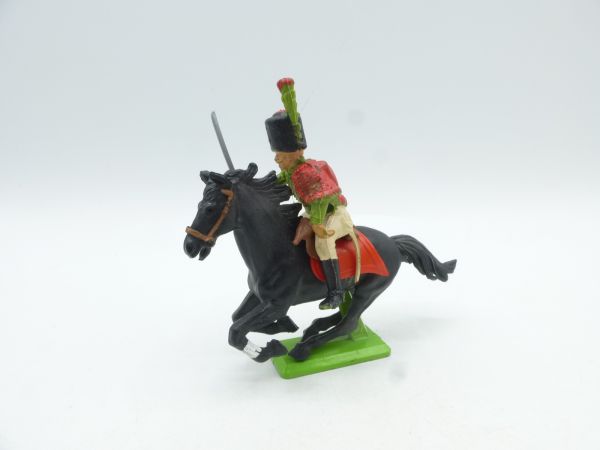 Britains Deetail Waterloo soldier on horseback, sabre high, green/red uniform