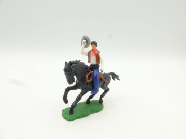 Elastolin 5,4 cm Cowboy riding with pistol, hand with hat in salute