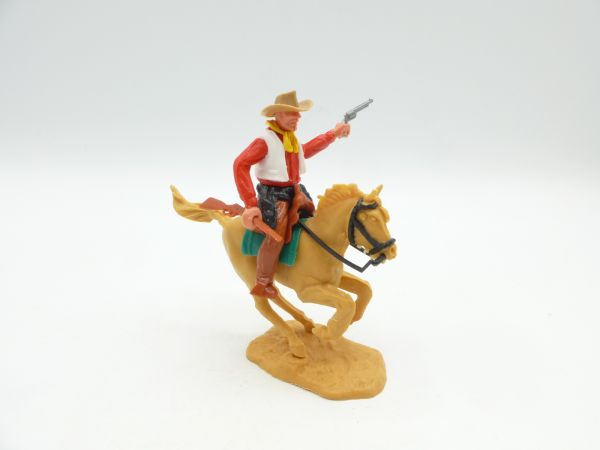 Timpo Toys Cowboy riding with pistol + rifle