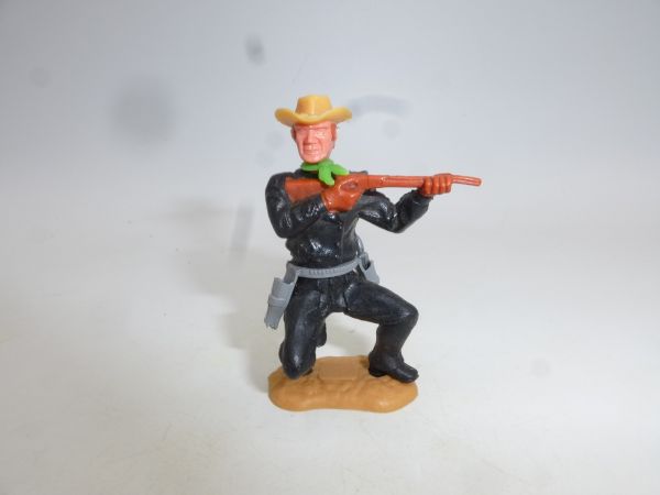 Timpo Toys Cowboy 3. Version hockend mit kurzem Gewehr, schwarz