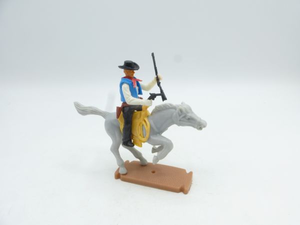 Plasty Cowboy riding with pistol + rifle