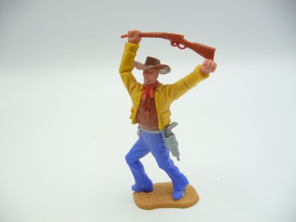 Timpo Toys Cowboy 2. Version vorgehend mit Gewehr schlagend