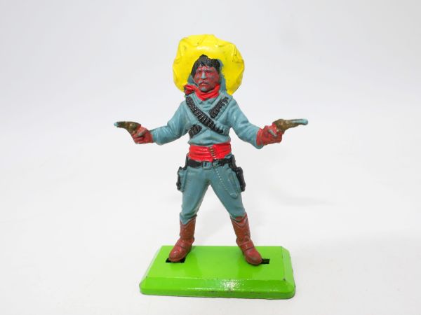 Britains Deetail Mexican standing, firing 2 pistols, yellow sombrero