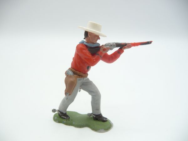 Britains Swoppets Cowboy going ahead, firing rifle + 2 pistols