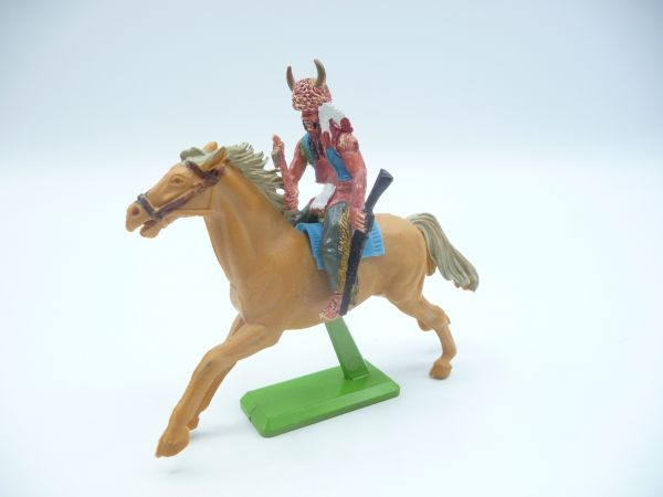 Britains Deetail Indian riding with rifle + tomahawk