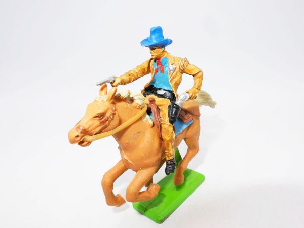Britains Deetail Cowboy / Sheriff zu Pferd, Pistole schießend + ziehend