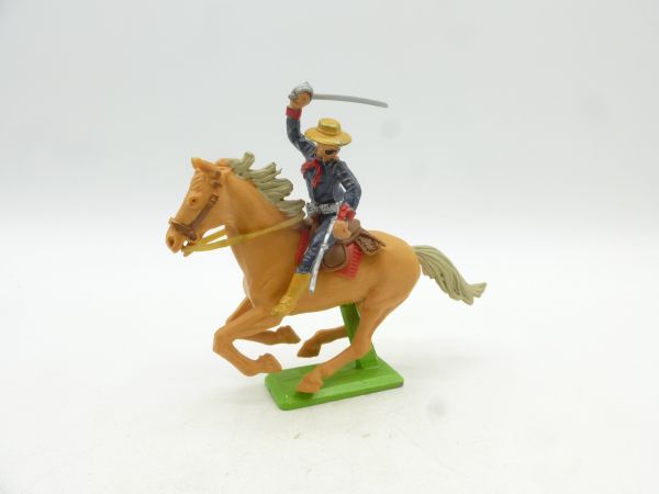 Britains Deetail Mexican riding, striking with sabre