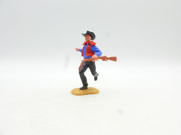 Timpo Toys Cowboy 2nd version running, rifle sideways