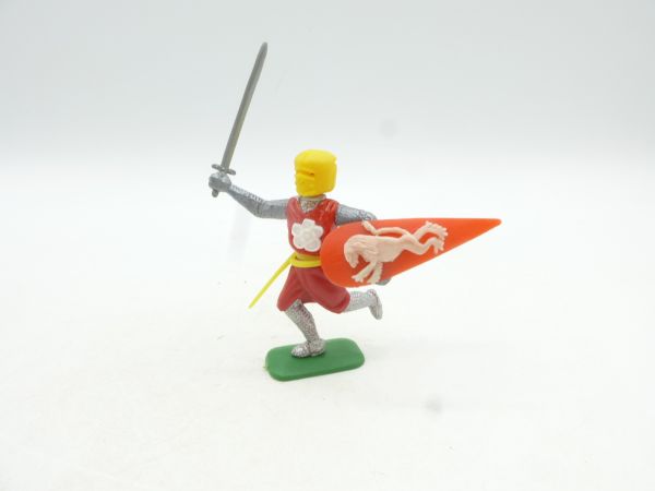 Medieval knight standing with sword, yellow head