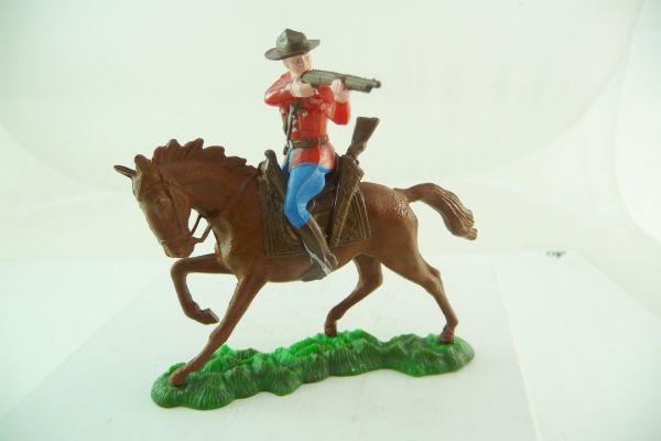 Reisler hard plastic Cowboy riding firing with rifle at side - great horse