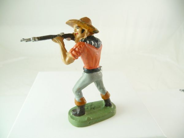 Leyla Cowboy standing firing with rifle - top condition