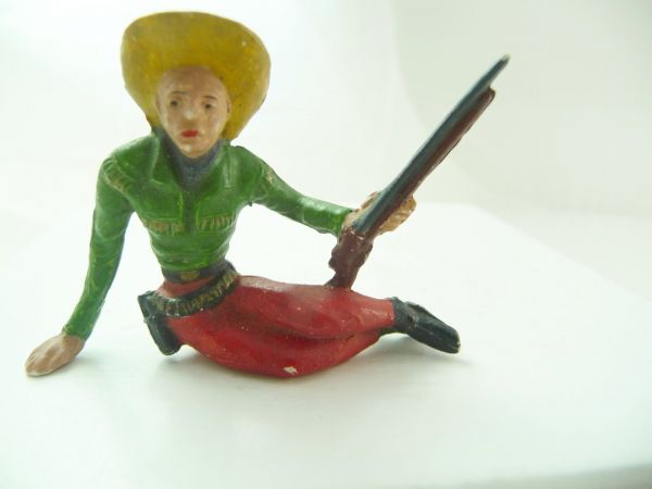 Merten 6 / 7 cm Cowboy sitting on side with rifle - s. photos
