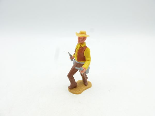 Timpo Toys Cowboy 3. Version vorgehend mit 2 Pistolen