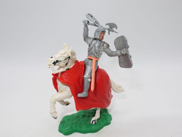 Timpo Toys Silver knight riding with battle axe, 1st version, red blanket