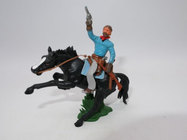 Britains Swoppets Cowboy riding with pistol + rifle