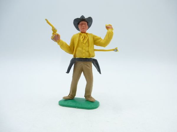 Timpo Toys Cowboy 1st version, yellow, hit by arrow