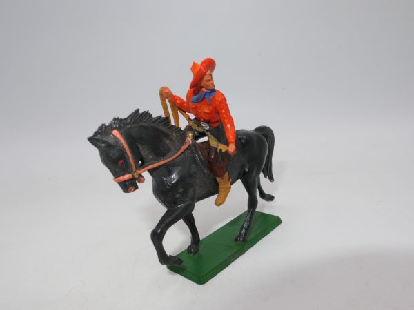 Starlux Cowboy on horseback, lasso ready to throw