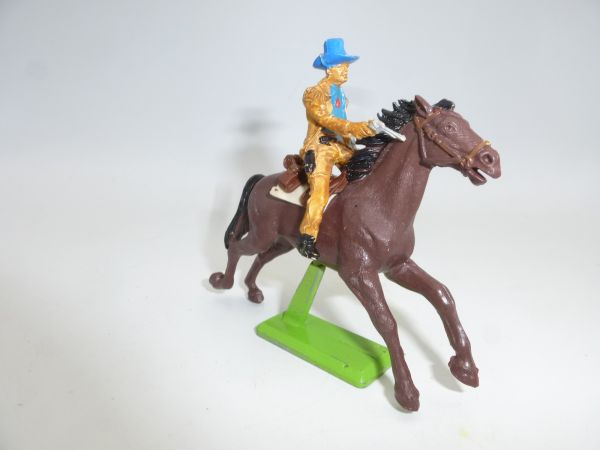 Britains Deetail Cowboy on horseback, shooting pistol
