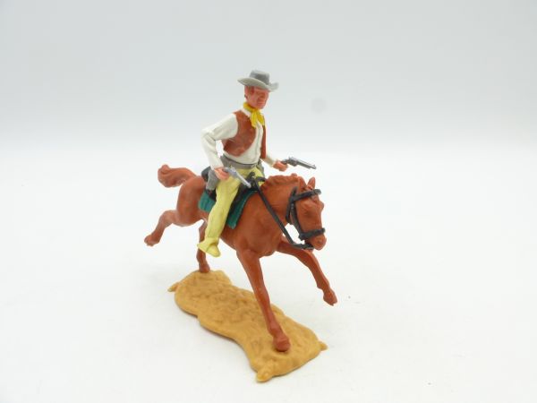 Timpo Toys Cowboy 3rd version riding with 2 pistols