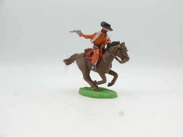 Britains Swoppets Cowboy riding / Bandit shooting pistol to the back (HK)