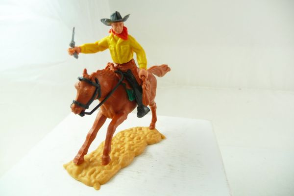 Timpo Toys Cowboy 2. Version reitend mit Pistole + Geldtasche