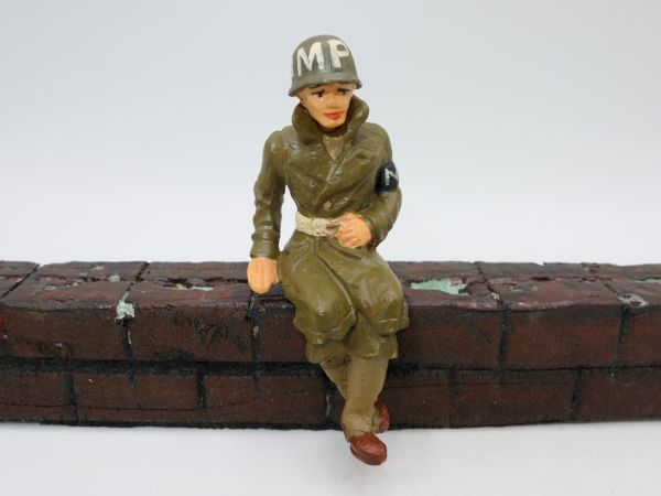 WW figure sitting for vehicles, presumably made of resin